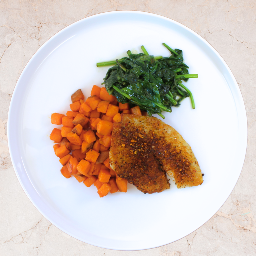Cajun Tilapia with Sweet roasted Potatoes & Wilted greens